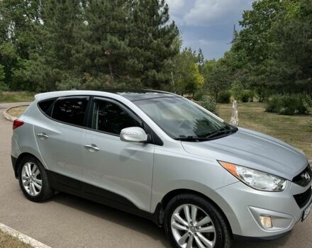 Серый Хендай Туксон, объемом двигателя 2.4 л и пробегом 164 тыс. км за 12500 $, фото 20 на Automoto.ua