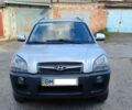Серый Хендай Туксон, объемом двигателя 2 л и пробегом 146 тыс. км за 9750 $, фото 2 на Automoto.ua