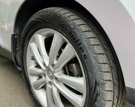 Серый Хендай Туксон, объемом двигателя 2.4 л и пробегом 164 тыс. км за 13200 $, фото 28 на Automoto.ua