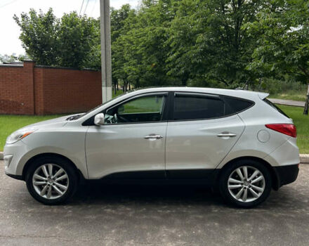 Серый Хендай Туксон, объемом двигателя 2.4 л и пробегом 164 тыс. км за 13200 $, фото 10 на Automoto.ua