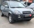 Серый Хендай Туксон, объемом двигателя 2 л и пробегом 148 тыс. км за 10390 $, фото 2 на Automoto.ua