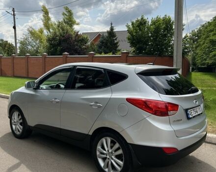 Серый Хендай Туксон, объемом двигателя 2.4 л и пробегом 164 тыс. км за 12500 $, фото 10 на Automoto.ua