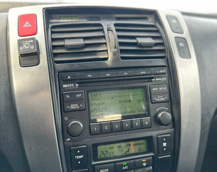 Сірий Хендай Туксон, об'ємом двигуна 1.98 л та пробігом 210 тис. км за 9999 $, фото 19 на Automoto.ua