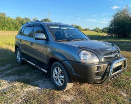 Сірий Хендай Туксон, об'ємом двигуна 2 л та пробігом 256 тис. км за 8900 $, фото 5 на Automoto.ua