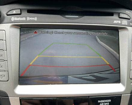 Серый Хендай Туксон, объемом двигателя 2.4 л и пробегом 164 тыс. км за 13200 $, фото 48 на Automoto.ua