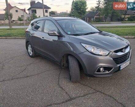 Сірий Хендай Туксон, об'ємом двигуна 2 л та пробігом 212 тис. км за 13600 $, фото 13 на Automoto.ua