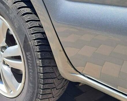 Серый Хендай Туксон, объемом двигателя 1.98 л и пробегом 206 тыс. км за 8500 $, фото 4 на Automoto.ua