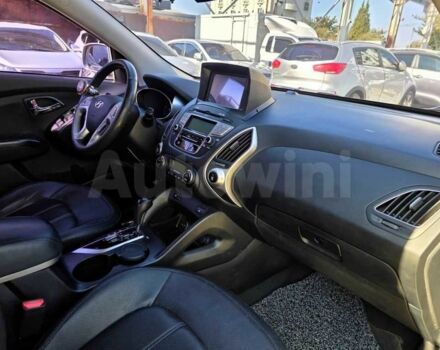 Сірий Хендай Туксон, об'ємом двигуна 2 л та пробігом 156 тис. км за 2500 $, фото 7 на Automoto.ua