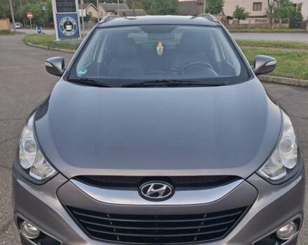 Сірий Хендай Туксон, об'ємом двигуна 2 л та пробігом 212 тис. км за 13600 $, фото 7 на Automoto.ua