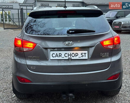 Сірий Хендай Туксон, об'ємом двигуна 1.69 л та пробігом 282 тис. км за 12000 $, фото 13 на Automoto.ua