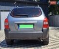 Серый Хендай Туксон, объемом двигателя 1.98 л и пробегом 206 тыс. км за 8500 $, фото 3 на Automoto.ua