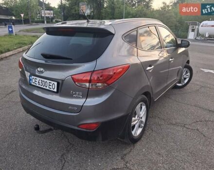 Сірий Хендай Туксон, об'ємом двигуна 2 л та пробігом 212 тис. км за 13600 $, фото 6 на Automoto.ua