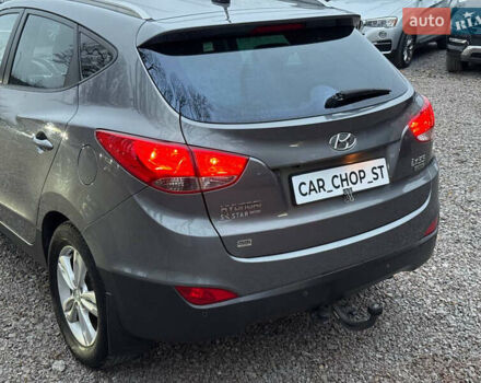 Сірий Хендай Туксон, об'ємом двигуна 1.69 л та пробігом 282 тис. км за 12000 $, фото 9 на Automoto.ua