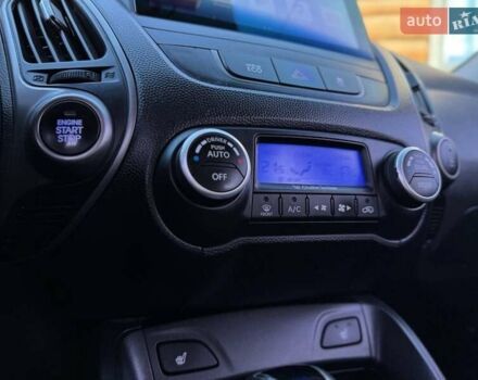 Сірий Хендай Туксон, об'ємом двигуна 2 л та пробігом 178 тис. км за 13800 $, фото 16 на Automoto.ua