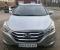 Серый Хендай Туксон, объемом двигателя 2.36 л и пробегом 150 тыс. км за 11500 $, фото 1 на Automoto.ua