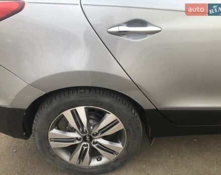 Сірий Хендай Туксон, об'ємом двигуна 2.36 л та пробігом 150 тис. км за 11500 $, фото 4 на Automoto.ua