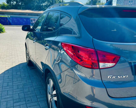 Сірий Хендай Туксон, об'ємом двигуна 2.4 л та пробігом 123 тис. км за 12500 $, фото 3 на Automoto.ua