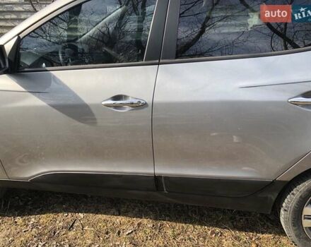 Сірий Хендай Туксон, об'ємом двигуна 2.36 л та пробігом 150 тис. км за 11500 $, фото 24 на Automoto.ua