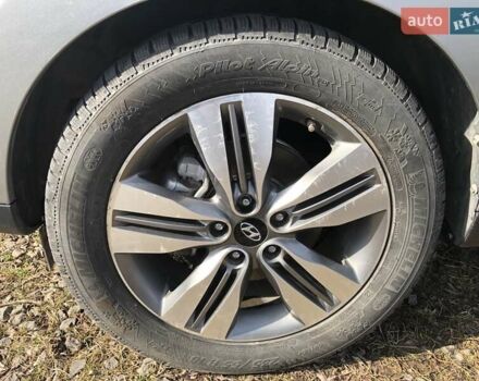 Сірий Хендай Туксон, об'ємом двигуна 2.36 л та пробігом 150 тис. км за 11500 $, фото 19 на Automoto.ua