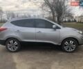 Сірий Хендай Туксон, об'ємом двигуна 2.36 л та пробігом 150 тис. км за 11500 $, фото 14 на Automoto.ua