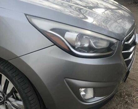 Сірий Хендай Туксон, об'ємом двигуна 2.36 л та пробігом 150 тис. км за 11500 $, фото 8 на Automoto.ua