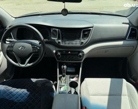Серый Хендай Туксон, объемом двигателя 1.6 л и пробегом 150 тыс. км за 14490 $, фото 14 на Automoto.ua