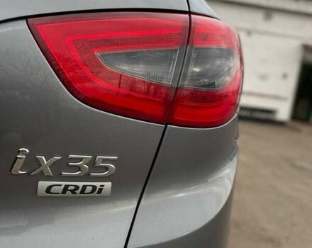 Серый Хендай Туксон, объемом двигателя 1.69 л и пробегом 293 тыс. км за 12950 $, фото 57 на Automoto.ua