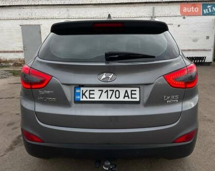 Серый Хендай Туксон, объемом двигателя 1.69 л и пробегом 293 тыс. км за 12950 $, фото 12 на Automoto.ua