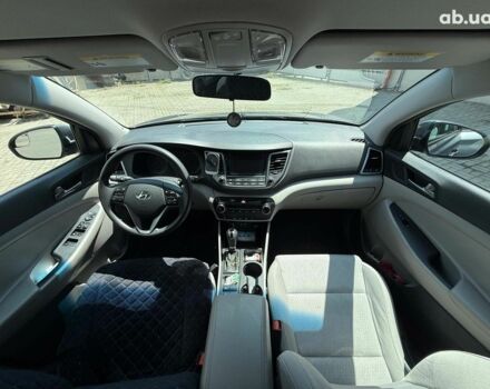 Серый Хендай Туксон, объемом двигателя 1.6 л и пробегом 150 тыс. км за 14490 $, фото 15 на Automoto.ua