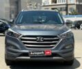 Серый Хендай Туксон, объемом двигателя 1.6 л и пробегом 150 тыс. км за 14490 $, фото 1 на Automoto.ua