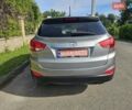 Серый Хендай Туксон, объемом двигателя 2.4 л и пробегом 181 тыс. км за 10200 $, фото 3 на Automoto.ua