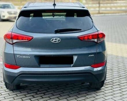 Серый Хендай Туксон, объемом двигателя 2 л и пробегом 79 тыс. км за 13500 $, фото 12 на Automoto.ua