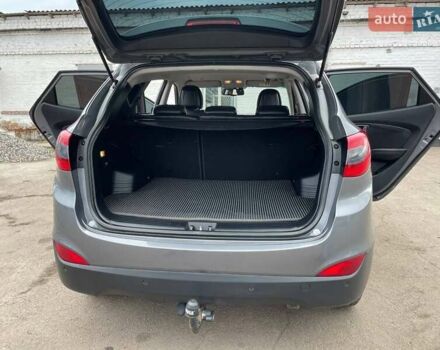 Серый Хендай Туксон, объемом двигателя 1.69 л и пробегом 293 тыс. км за 12950 $, фото 13 на Automoto.ua