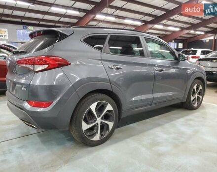 Серый Хендай Туксон, объемом двигателя 1.6 л и пробегом 157 тыс. км за 2100 $, фото 2 на Automoto.ua