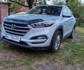 Серый Хендай Туксон, объемом двигателя 2 л и пробегом 131 тыс. км за 18700 $, фото 1 на Automoto.ua