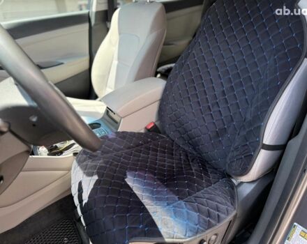 Серый Хендай Туксон, объемом двигателя 1.6 л и пробегом 150 тыс. км за 14490 $, фото 24 на Automoto.ua