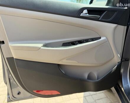 Серый Хендай Туксон, объемом двигателя 1.6 л и пробегом 150 тыс. км за 14490 $, фото 20 на Automoto.ua