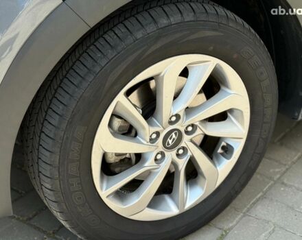 Серый Хендай Туксон, объемом двигателя 1.6 л и пробегом 150 тыс. км за 14490 $, фото 9 на Automoto.ua