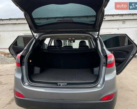 Серый Хендай Туксон, объемом двигателя 1.69 л и пробегом 293 тыс. км за 12950 $, фото 14 на Automoto.ua