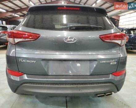 Серый Хендай Туксон, объемом двигателя 1.6 л и пробегом 157 тыс. км за 2100 $, фото 5 на Automoto.ua