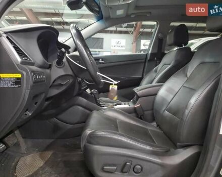 Серый Хендай Туксон, объемом двигателя 1.6 л и пробегом 157 тыс. км за 2100 $, фото 6 на Automoto.ua