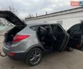 Серый Хендай Туксон, объемом двигателя 1.69 л и пробегом 293 тыс. км за 12950 $, фото 7 на Automoto.ua