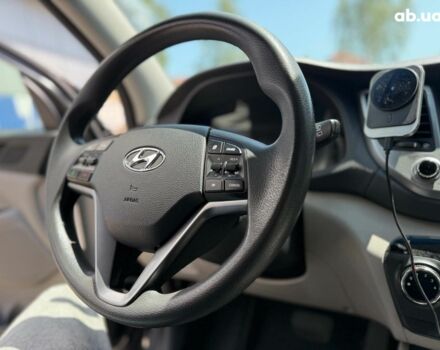 Серый Хендай Туксон, объемом двигателя 1.6 л и пробегом 150 тыс. км за 14490 $, фото 32 на Automoto.ua