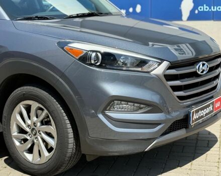 Серый Хендай Туксон, объемом двигателя 1.6 л и пробегом 150 тыс. км за 14490 $, фото 3 на Automoto.ua