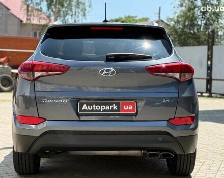 Серый Хендай Туксон, объемом двигателя 1.6 л и пробегом 150 тыс. км за 14490 $, фото 6 на Automoto.ua