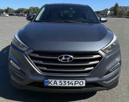 Серый Хендай Туксон, объемом двигателя 2 л и пробегом 199 тыс. км за 13000 $, фото 1 на Automoto.ua