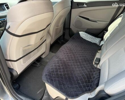 Серый Хендай Туксон, объемом двигателя 1.6 л и пробегом 150 тыс. км за 14490 $, фото 10 на Automoto.ua