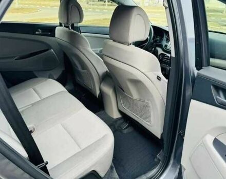 Серый Хендай Туксон, объемом двигателя 2 л и пробегом 79 тыс. км за 13500 $, фото 11 на Automoto.ua