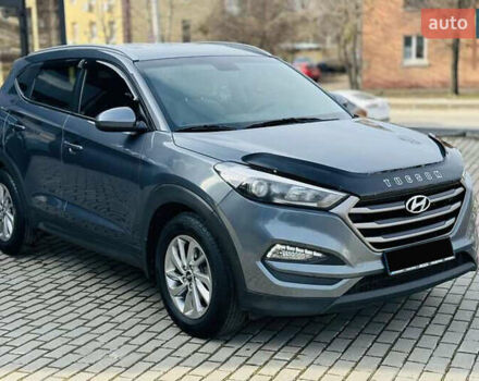 Серый Хендай Туксон, объемом двигателя 2 л и пробегом 79 тыс. км за 15500 $, фото 2 на Automoto.ua