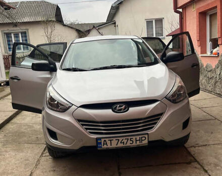 Сірий Хендай Туксон, об'ємом двигуна 2 л та пробігом 141 тис. км за 13500 $, фото 12 на Automoto.ua